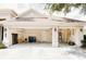 View of a clean, organized, spacious two-car garage featuring storage racks at 8338 Old Town Dr, Tampa, FL 33647