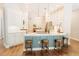 Bright, updated kitchen with modern appliances, white cabinets, breakfast bar, and pendant lighting at 8338 Old Town Dr, Tampa, FL 33647