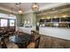 Interior of cafe with tables, chairs, counter service, and menu board at 8717 Emeraldwood Way, Land O Lakes, FL 34637
