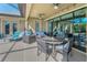 Spacious covered patio with comfortable seating, perfect for outdoor entertainment at 8717 Emeraldwood Way, Land O Lakes, FL 34637