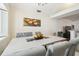 Modern dining room with neutral colors and seating for six at 8728 Mcadam Pl, Tampa, FL 33634