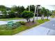 A Welcome to Westlake Village sign is visible among trees and landscaping at 915 Rolling Hills Dr, Palm Harbor, FL 34683