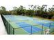 Overhead aerial view of tennis/pickle ball courts at 915 Rolling Hills Dr, Palm Harbor, FL 34683