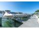 Several boats are docked in a marina, offering convenient access to boating and water activities at 1 Key Capri # 303E, Treasure Island, FL 33706