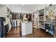 Large walk-in closet with custom shelving, hanging rods, and ample storage space at 101 Biscayne Ave, Tampa, FL 33606