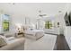 Spacious main bedroom with large windows, sitting area, and hardwood floors at 101 Biscayne Ave, Tampa, FL 33606