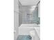 Updated bathroom features a shower and tub combination with tile surround and modern fixtures at 1011 Coldstream Ct, Tarpon Springs, FL 34689