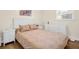 Primary bedroom features a comfortable bed and matching furniture including night stands and dressers at 1011 Coldstream Ct, Tarpon Springs, FL 34689