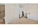 Bedroom featuring a bed, closet, en-suite bathroom, and furniture; natural light throughout at 1011 Coldstream Ct, Tarpon Springs, FL 34689