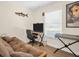 Spare bedroom with a futon, desk and keyboard; perfect as a guest room or office at 1011 Coldstream Ct, Tarpon Springs, FL 34689