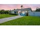 Charming single-story home with a well-manicured lawn and inviting curb appeal at 1011 Coldstream Ct, Tarpon Springs, FL 34689
