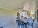 The screened patio is perfect for outdoor entertaining; easy access from indoor kitchen or back yard at 1011 Coldstream Ct, Tarpon Springs, FL 34689