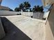Backyard features a concrete patio area, storage shed, and fenced perimeter at 10414 Rosemount Dr, Tampa, FL 33624