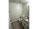 Bathroom featuring granite countertop and vanity with new fixtures at 10414 Rosemount Dr, Tampa, FL 33624