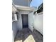 Exterior view of the property showing a storage room or small outbuilding at 10414 Rosemount Dr, Tampa, FL 33624