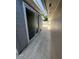 Exterior view of the side yard area, showing the walkway at 10414 Rosemount Dr, Tampa, FL 33624