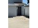 Exterior view of the property showing a storage room or small outbuilding at 10414 Rosemount Dr, Tampa, FL 33624