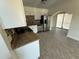 Kitchen featuring granite countertops, tile backsplash, and stainless steel appliances at 10414 Rosemount Dr, Tampa, FL 33624