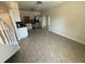 Open concept living room with modern tile flooring at 10414 Rosemount Dr, Tampa, FL 33624