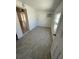 Small room with tile floors, window, and doorway at 10414 Rosemount Dr, Tampa, FL 33624