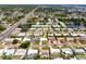 Aerial view of a home with a large lot in a neighborhood with nearby lakes and parks at 11225 59Th Ave, Seminole, FL 33772