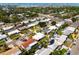 An aerial view of the neighborhood and the home's proximity to the water in a quiet and established community at 11225 59Th Ave, Seminole, FL 33772