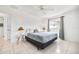 Bedroom featuring neutral color palette, bedside lamps, and tile floors at 11225 59Th Ave, Seminole, FL 33772