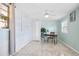 Light and airy bedroom with decorative color wash, ceiling fan, and tile floors at 11225 59Th Ave, Seminole, FL 33772