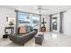 Bright living room featuring tile floors, comfortable sofa and large windows at 11225 59Th Ave, Seminole, FL 33772