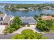 Stunning waterfront property with lush landscaping, a private dock, and serene views of the bay at 1124 35Th Ne Ave, St Petersburg, FL 33704