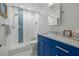 Updated bathroom featuring glass enclosed shower and modern vanity at 1124 35Th Ne Ave, St Petersburg, FL 33704