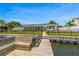 Dock on the canal ready for your boat with a house in the background at 1124 35Th Ne Ave, St Petersburg, FL 33704