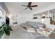 Open floor plan showcasing the living room, kitchen, and view to the dining room and bedroom at 1124 35Th Ne Ave, St Petersburg, FL 33704