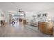 Bright, open-concept living and dining area with neutral tones, modern decor, and lots of natural light at 1124 35Th Ne Ave, St Petersburg, FL 33704