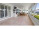 Enclosed patio with multiple windows, a BBQ and view of the Intercoastal waterway at 1124 35Th Ne Ave, St Petersburg, FL 33704