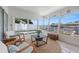 Enclosed patio with a view of the pool and Intercoastal waterway at 1124 35Th Ne Ave, St Petersburg, FL 33704