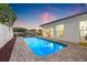 Private pool with patio, lush greenery, and serene waterfront views creating a perfect backyard oasis at 1124 35Th Ne Ave, St Petersburg, FL 33704