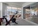 Relaxing sun room with Peloton bike and sliding doors to lanai at 1124 35Th Ne Ave, St Petersburg, FL 33704