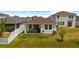 This home includes an outdoor patio and spacious backyard, perfect for relaxation and outdoor entertaining at 11819 Brighton Knoll Loop, Riverview, FL 33579