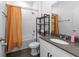 Clean bathroom with a vanity, mirror, and shower-tub combination at 11819 Brighton Knoll Loop, Riverview, FL 33579
