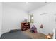 Cozy bedroom with a comfortable bed, a window, and a closet at 11819 Brighton Knoll Loop, Riverview, FL 33579