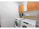 Functional laundry room featuring a washer and dryer at 11819 Brighton Knoll Loop, Riverview, FL 33579