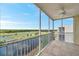 Relax on the screened-in balcony with tile flooring and enjoy water and golf course views at 1200 Country Club Dr # 5506, Largo, FL 33771