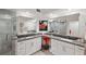 Spacious bathroom featuring dual vanities and walk-in shower at 1200 Country Club Dr # 5506, Largo, FL 33771