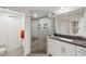 Stylish bathroom featuring walk-in shower, granite vanity, and tile floors at 1200 Country Club Dr # 5506, Largo, FL 33771