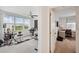 Bright bedroom with a large window and ceiling fan, used as music studio at 1200 Country Club Dr # 5506, Largo, FL 33771