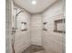 Up close shot of the stylish bathroom shower featuring tile walls at 1200 Country Club Dr # 5506, Largo, FL 33771