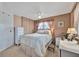 Cozy bedroom with built in cabinets and a ceiling fan, providing comfortable sleeping space at 123 Saint Kitts Way, Apollo Beach, FL 33572