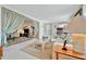 Spacious living room featuring an open floor plan with a dining area with neutral carpeting at 123 Saint Kitts Way, Apollo Beach, FL 33572