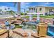 Outdoor water feature with decorative elements and lush landscaping creating a serene ambiance at 123 Saint Kitts Way, Apollo Beach, FL 33572